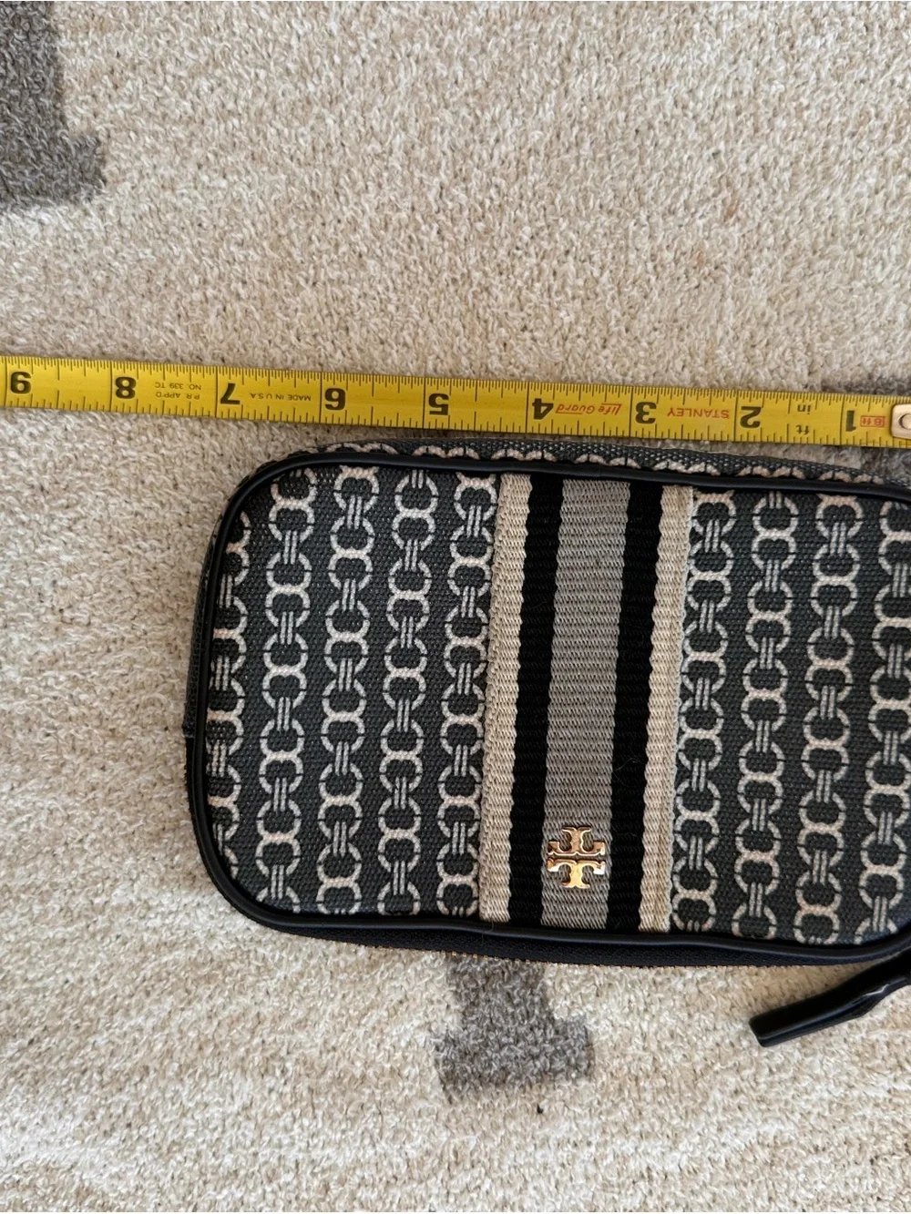 Tory Burch Black and Tan Patterned Logo Wristlet with Stripe Detail